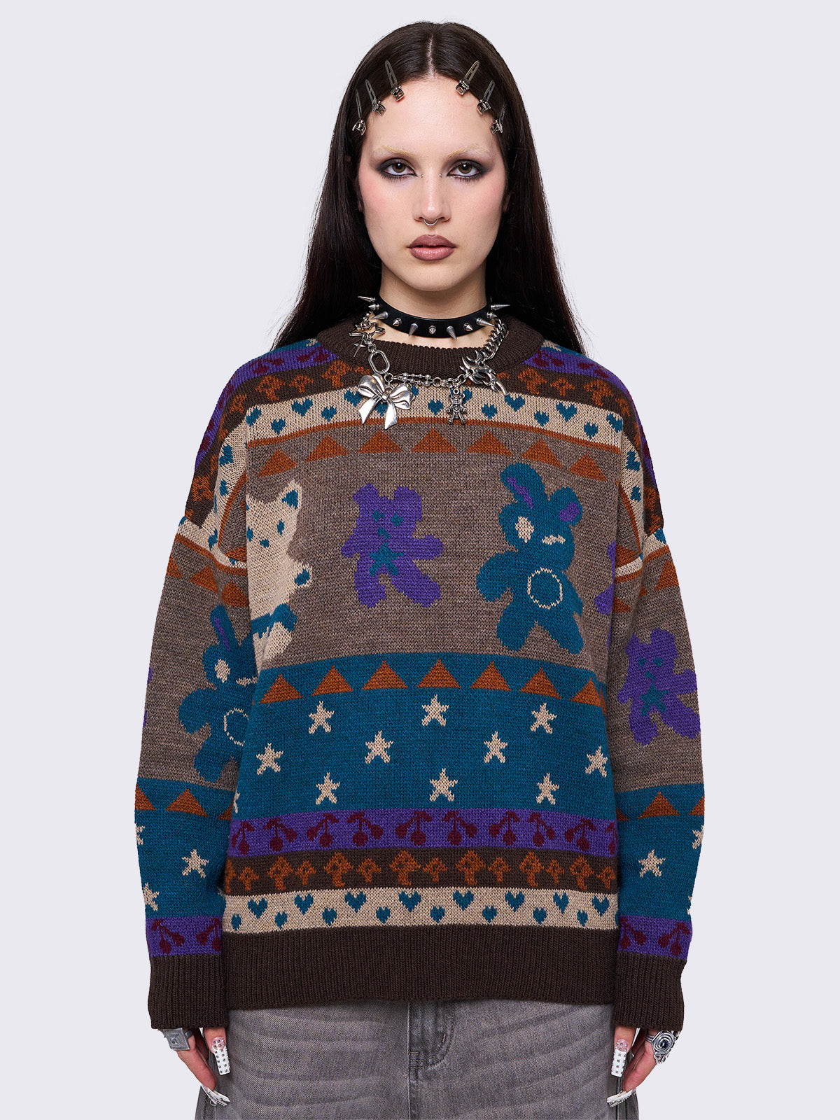 Jacquard knit jumper with playful motifs including teddy bear, stars, cherries and more.