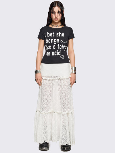 White floral lace maxi skirt with tiered lace layers with ruffles, lace-up sides with bow ties and eyelet trim details.