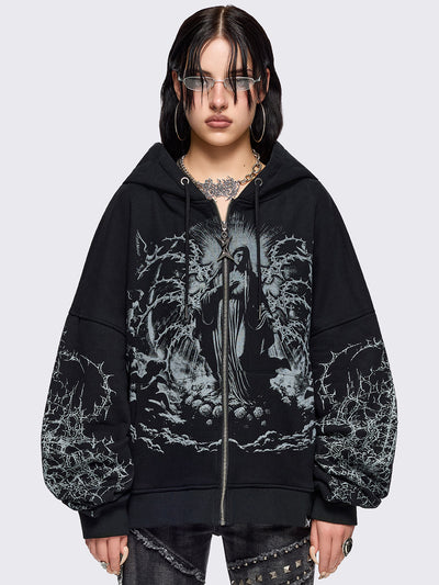 Black zip up hoodie jacket featuring a sacred figure graphic on front and thorn sleeve prints.