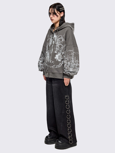 Grey zip up hoodie jacket featuring a sacred figure graphic on front and thorn sleeve prints.