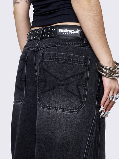 Black washed super baggy jeans with a relaxed fit, regular waist, zip fly, button fastening, and belt loops. Trendy streetwear style.