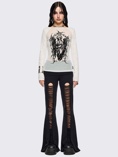 White semi-sheer long sleeve top with a sacred figure graphic front print and mesh contrast.