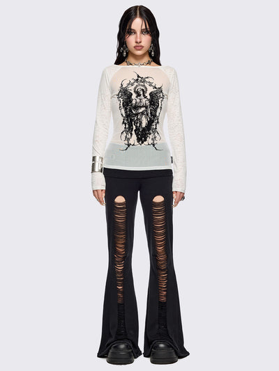 Black distressed flare pants with ribbed waistband. 