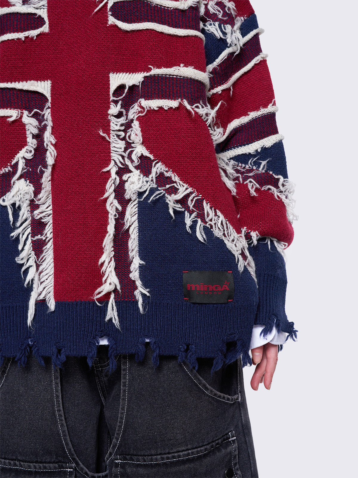 Knitted sweater with frayed uk flag and distressed details