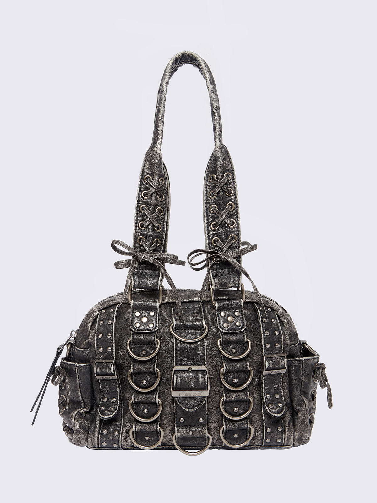 Black washed faux leather shoulder bag with multiple D-rings, buckles and hardware details, worn on shoulder with lace-up strap design.