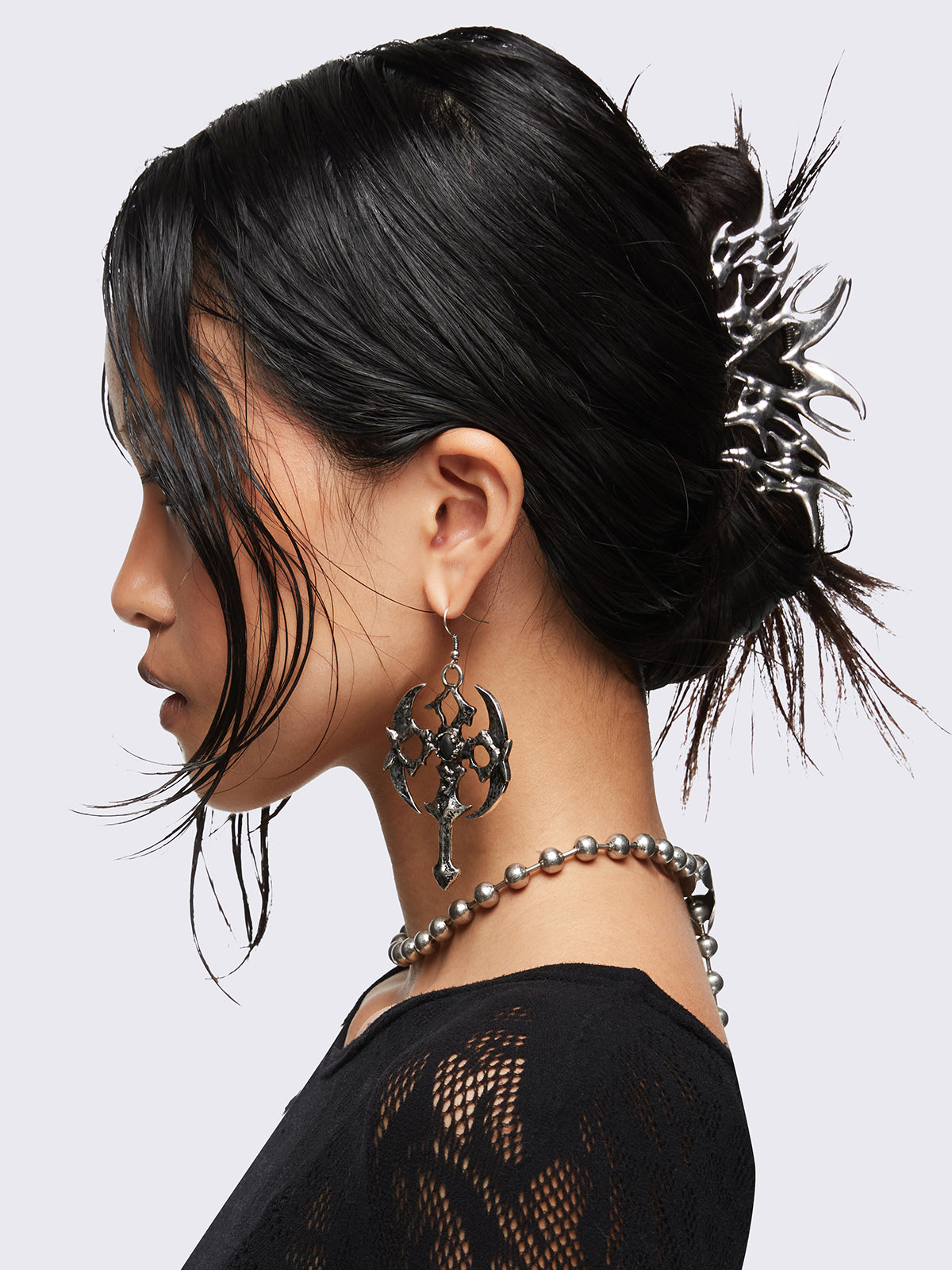 Metal hair claw clip with cyber sigilism heart tattoo design featuring oxidized silver finish.