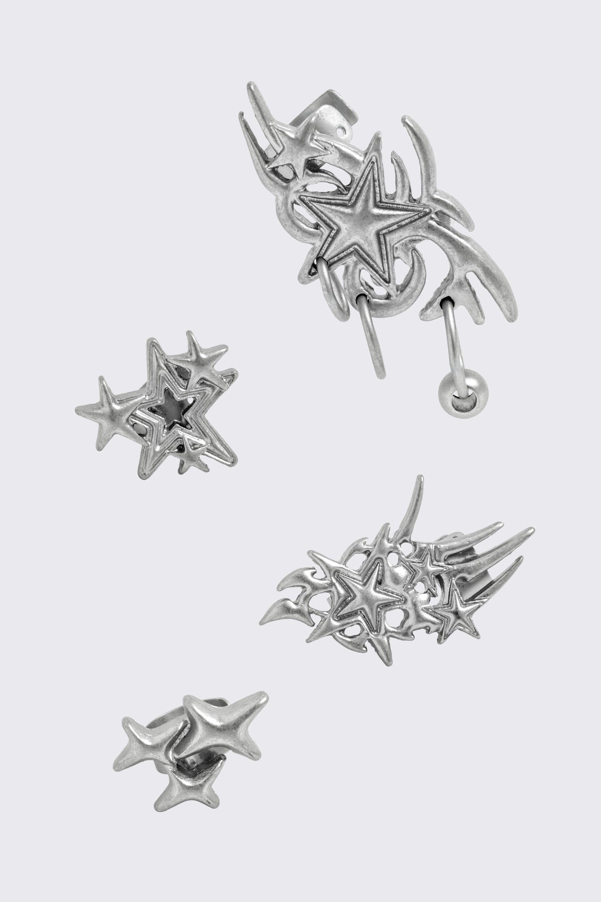 Silver chunky earring set with ear cuffs. All stars design. 