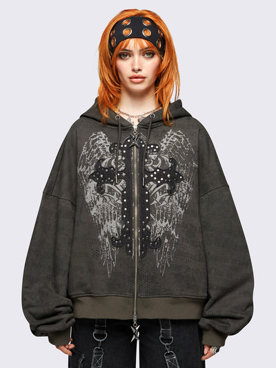 Khaki zip up hoodie jacket featuring a letterings and wings graphic print and cross patch with studded details.