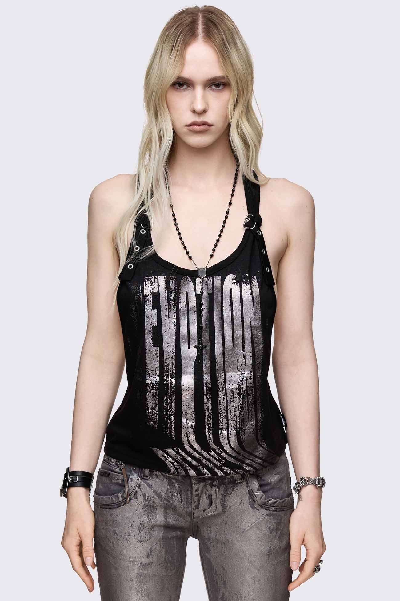 Black graphic tank top with distressed silver foil print, buckle straps, racerback and deep cut-out armholes.