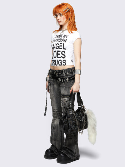 Black washed cargo flared jeans with utility pockets and straps.