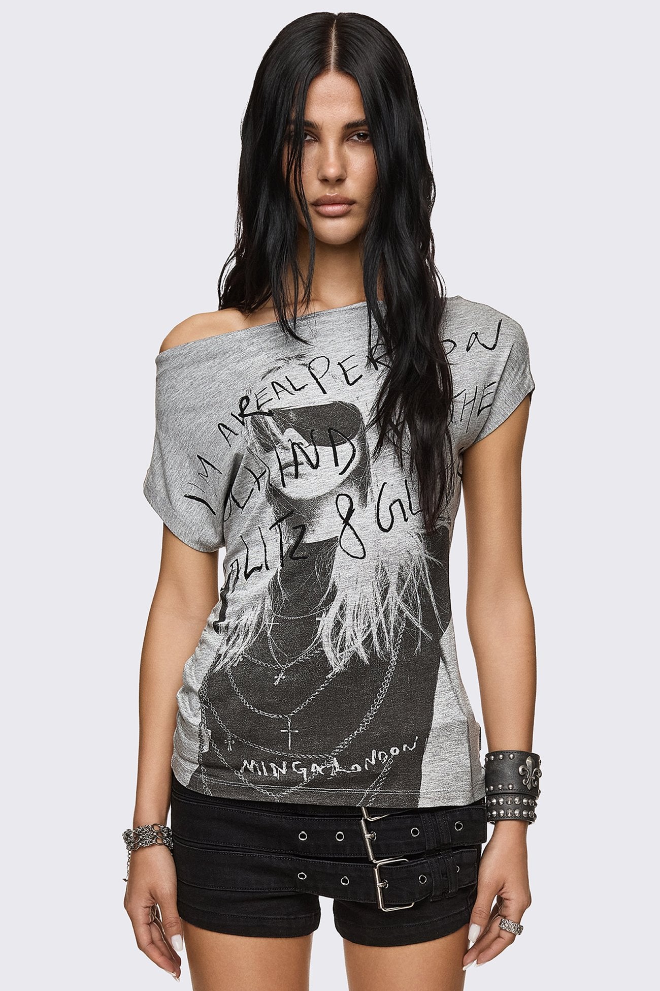 Grey marl viscose off-shoulder top with girl graphic print and asymmetrical neckline in a grunge Y2K style.