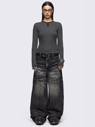 Black and grey striped ribbed long sleeve top featuring a half button placket.