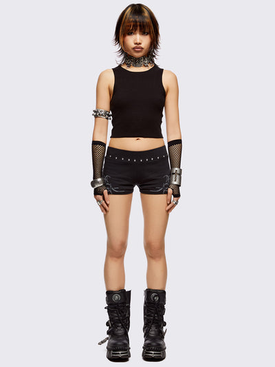 Black sweat shorts hot pants with silver studded waistline and sigilism graphic side print.