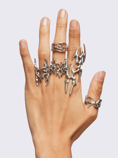 Set of 5 silver rings with sigilism tribal designs.