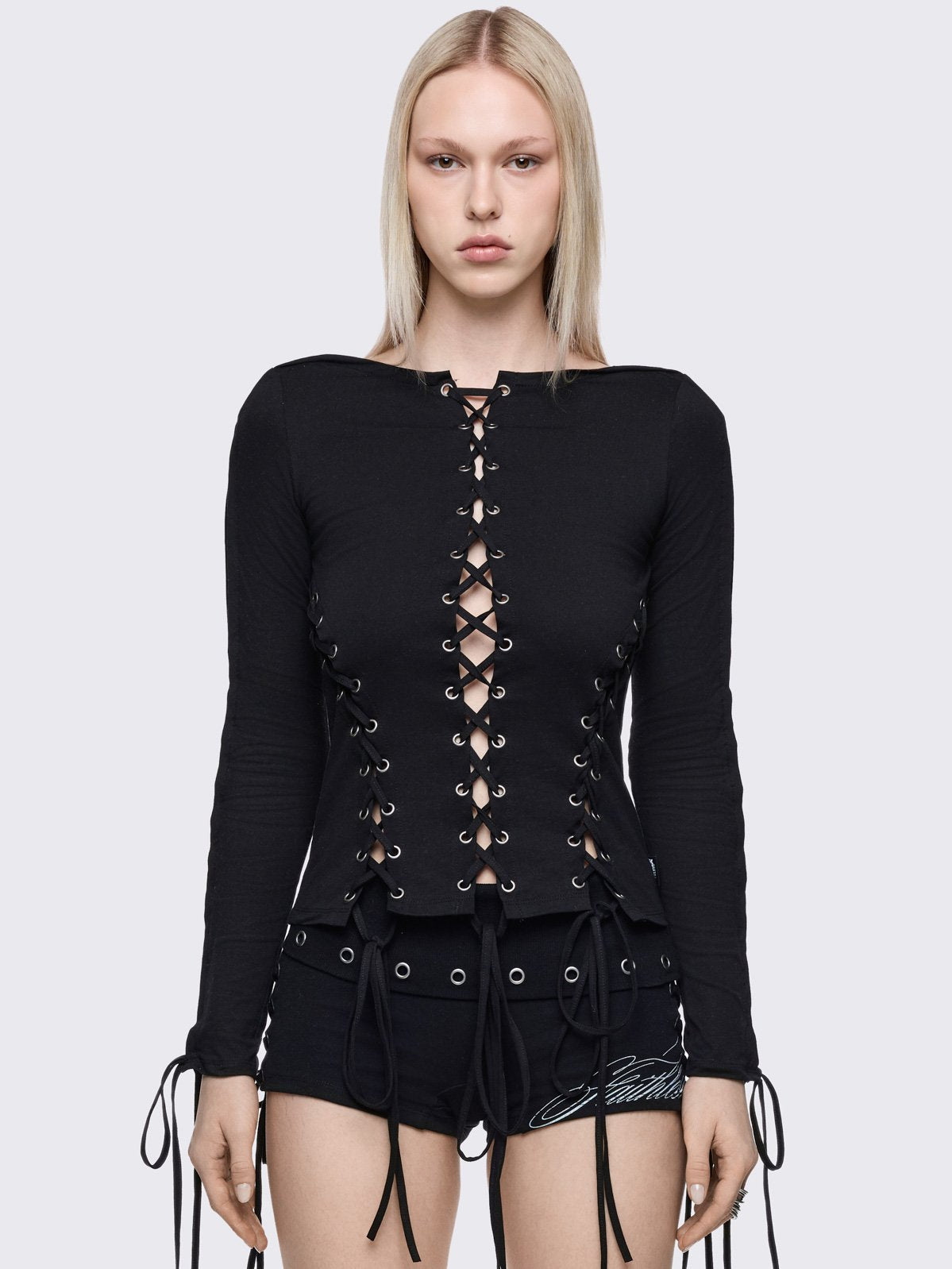 Black long sleeve lace-up top.