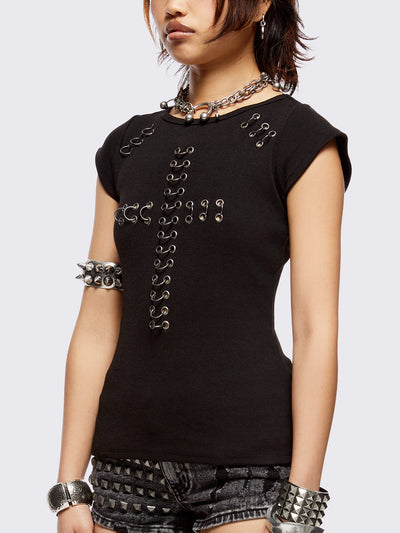 Black baby tee with pierced silver cross. Grunge goth vibes. 