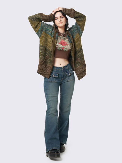 Zip up hood knitted cardigan featuring a oversized fit and green, brown and blue degrade stripes.