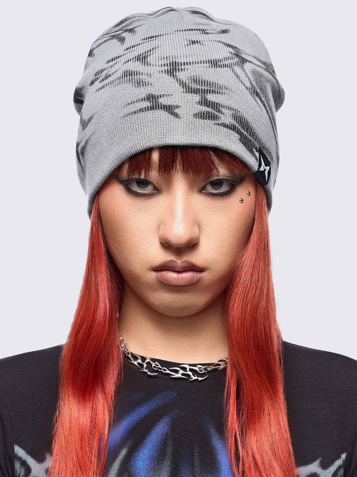 Grey beanie hat featuring a graphic print by cold𝐹33t designer.