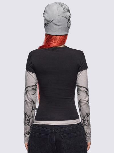 Black layered long sleeve top with grey contrast sleeves featuring a graphic print by cold𝐹33t designer.
