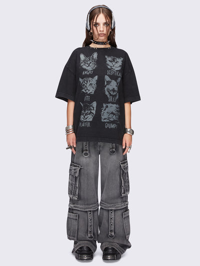 Black washed oversized t-shirt with kitty's mood graphic front print and eyelet and spike neckline details.