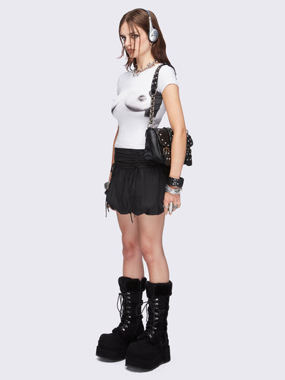 Black puffball mini skirt with a ruched tie-front and bow detail, featuring a voluminous balloon-style silhouette.
