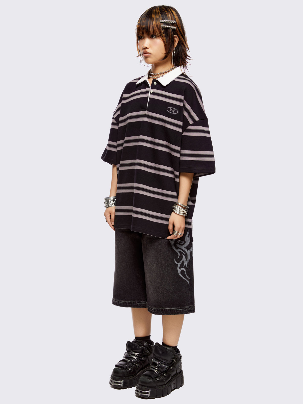 Black and grey striped rugby polo with white spread collar and a oversized fit.