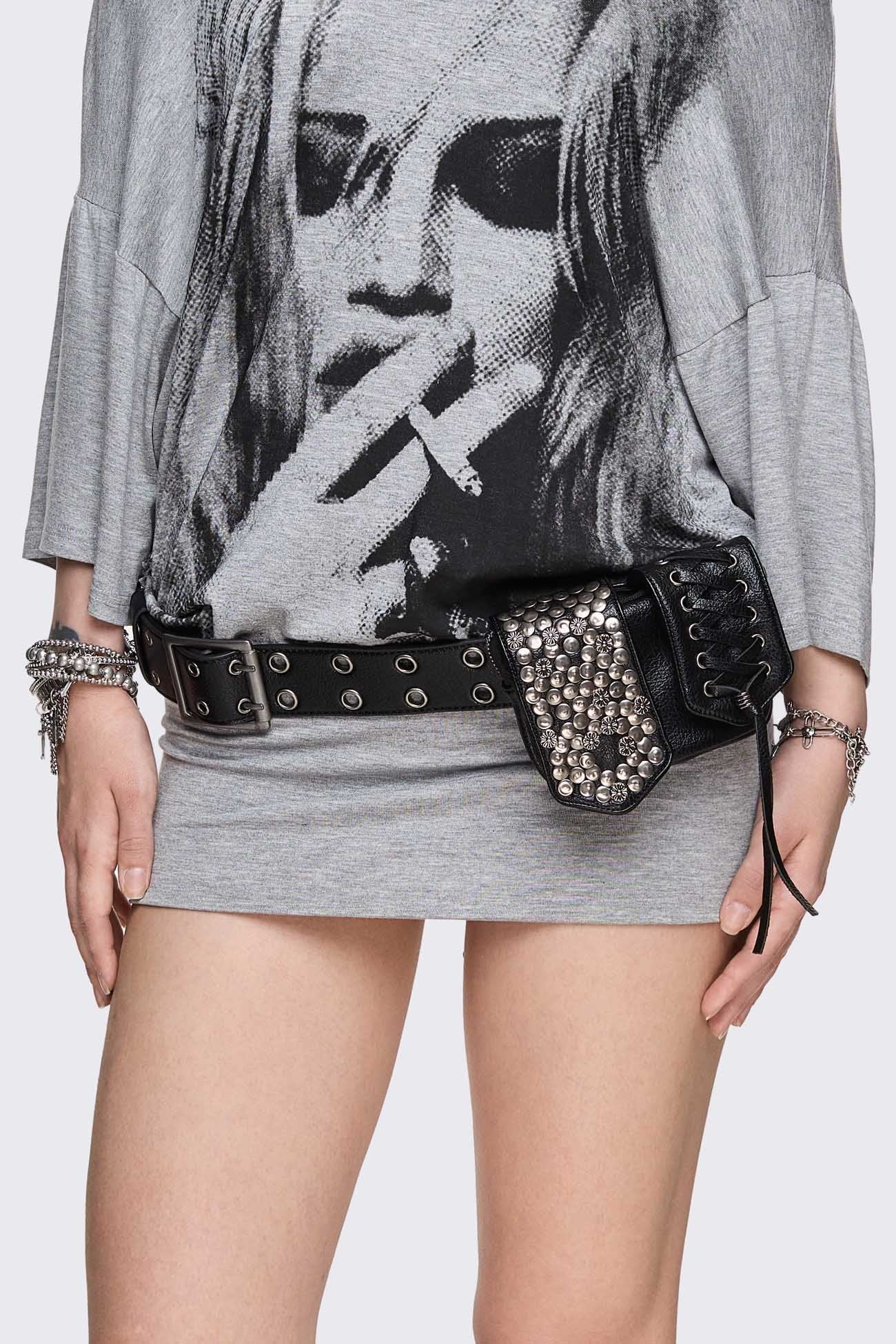 Black vegan leather utility belt with detachable studded pouches, lace-up detail and silver buckle in grunge style.