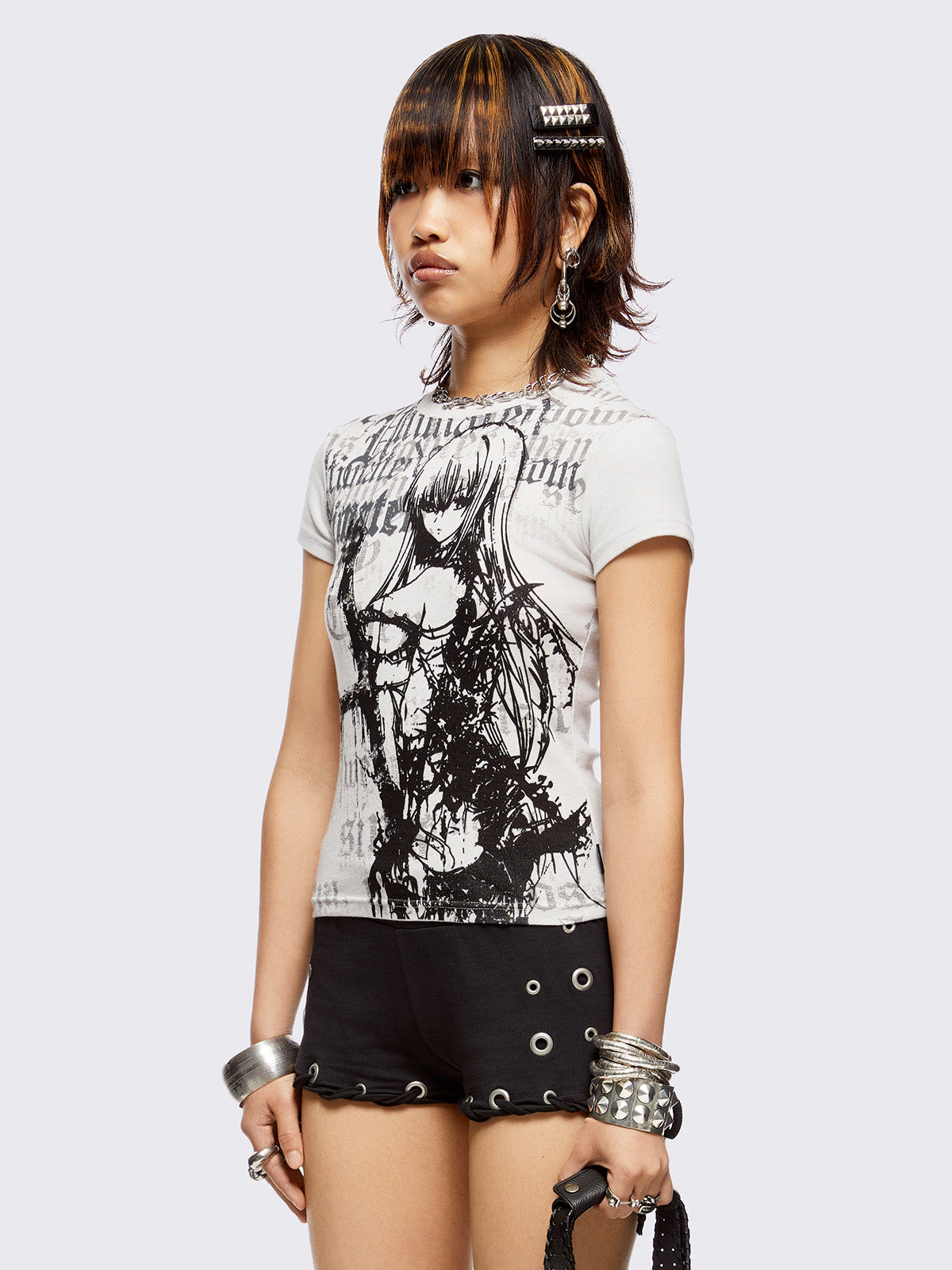 Off-white graphic baby tee with dark goth girl fantasy graphic print.