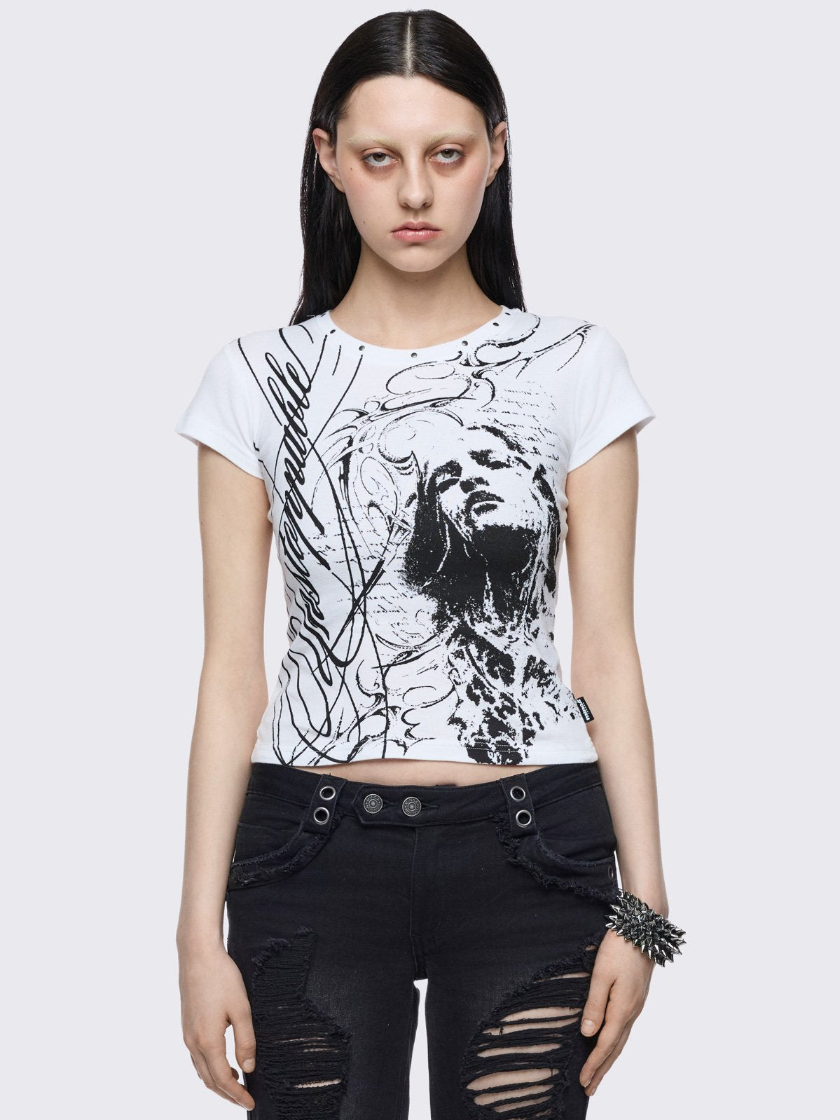 White baby t-shirt with "unstoppable" graphic print in black