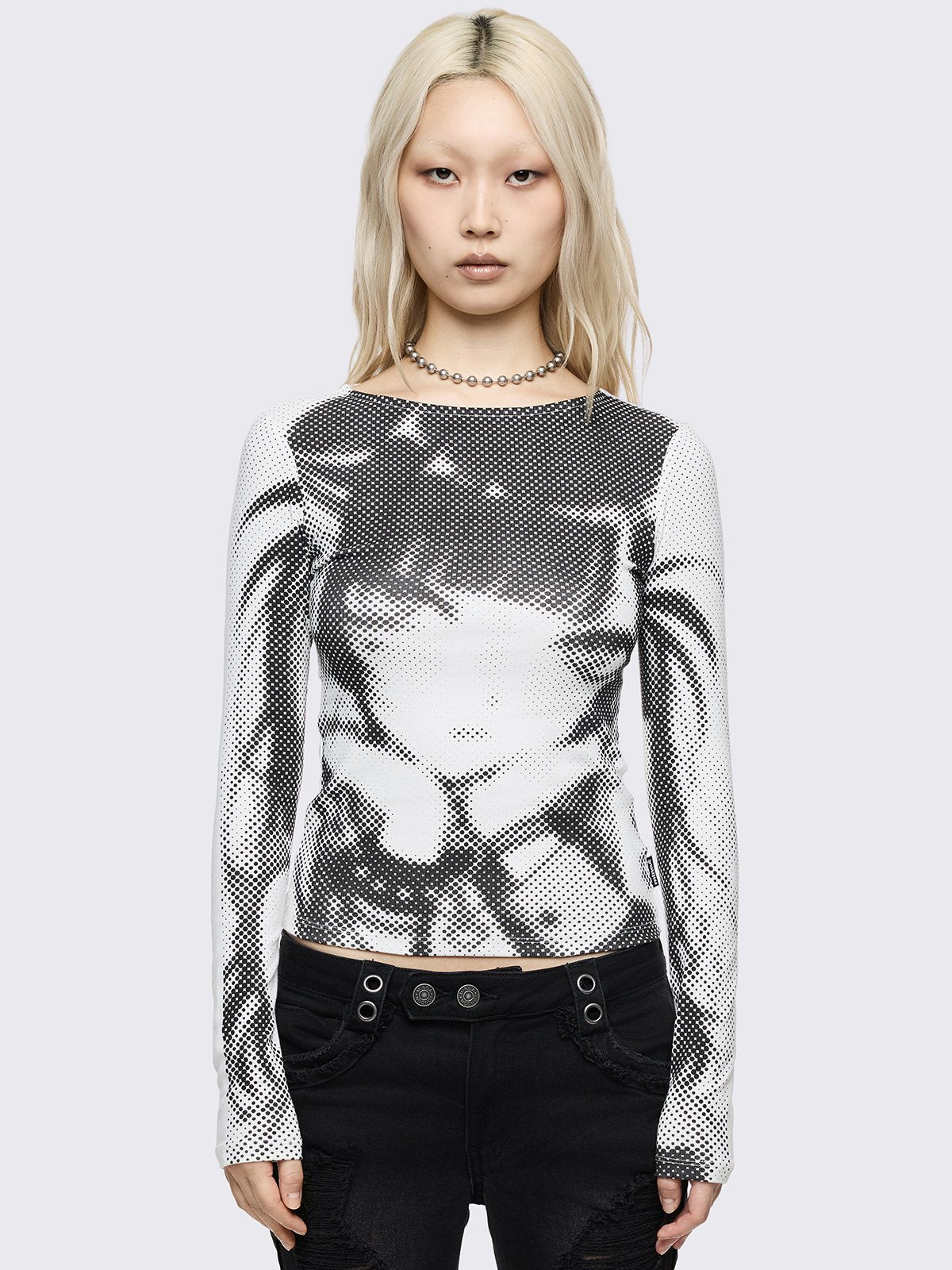 Off-white long sleeve top with pixel anime girl graphic print.