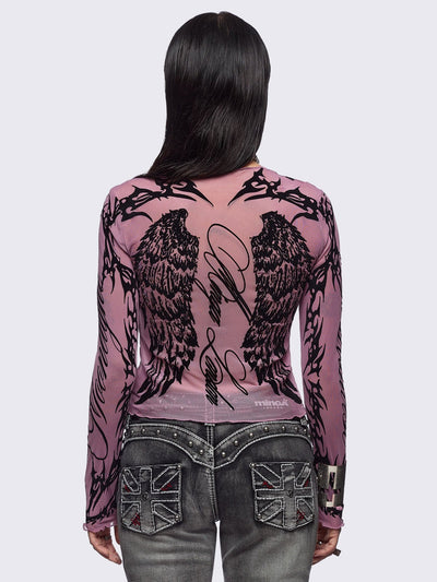 Pink mesh top with black winged corset and sigilism graphic print.